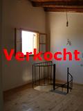 de slaapkamer met de trap die naar beneden gaat