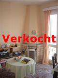 woonkamer met openhaard