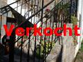 trap naar boven naar het appartement