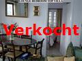 woonkamer en de slaapkamer