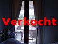 het balkon gezien vanuit de slaapkamer