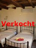 een van de slaapkamers