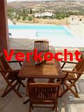terras met het zwembad